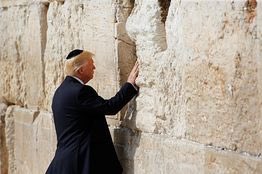 He was asked to look at ancient text explaining the importance of the wall,Men and women are separated in front of the wall but DJT is stood with Melanie which displays power,He is not a puppet for Zionist, they do not exist, there is just Venetians and the 13 blood line families