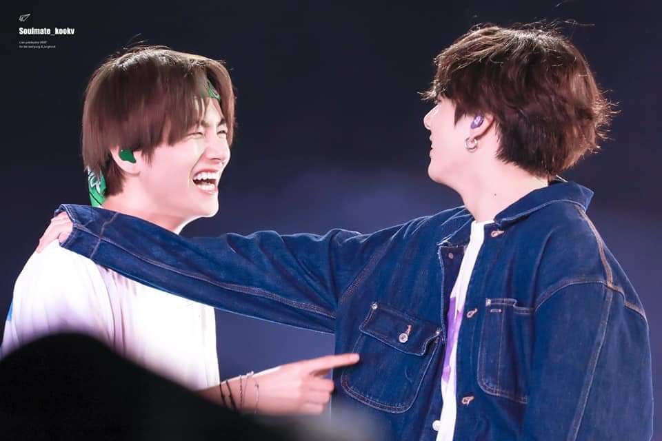 intertwining their hands