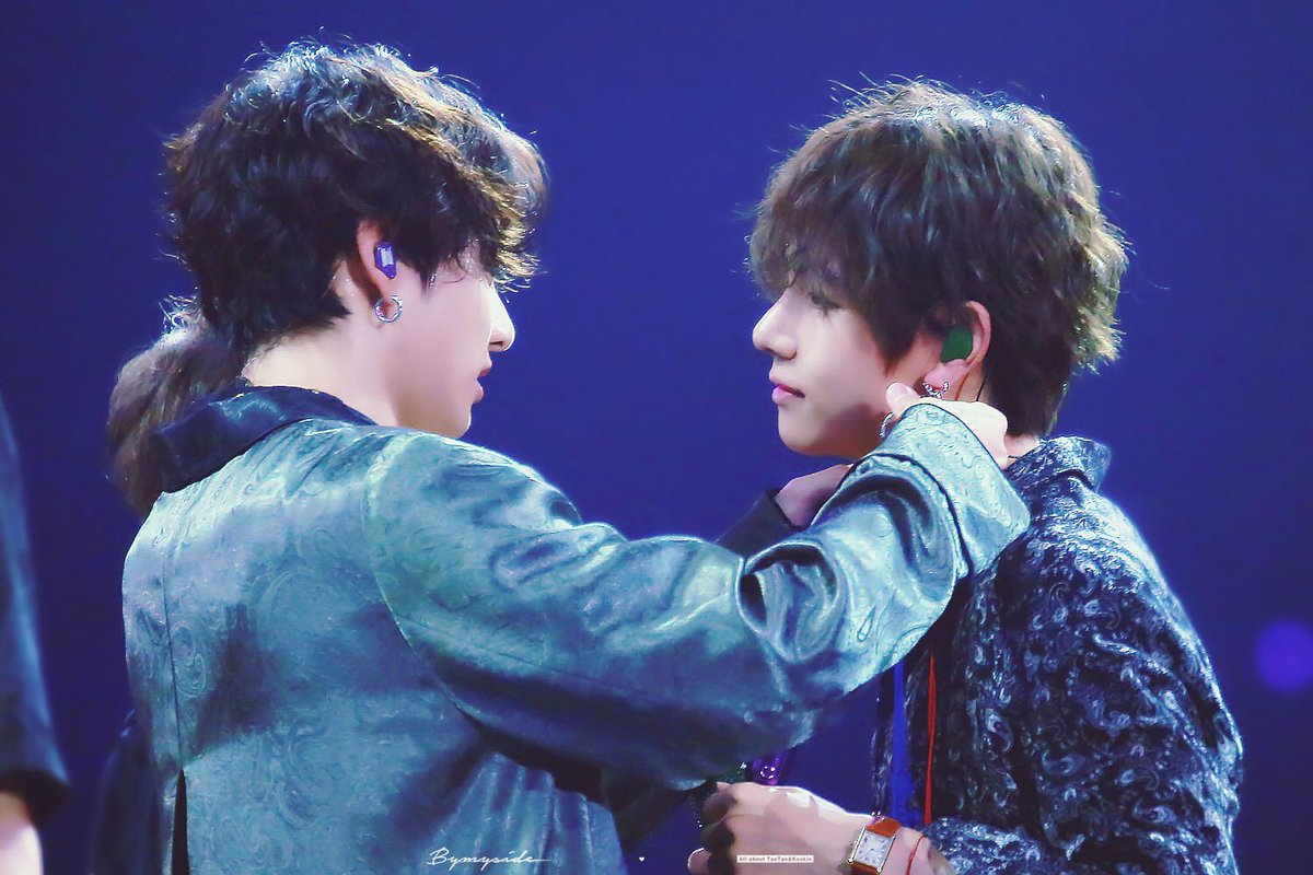 intertwining their hands