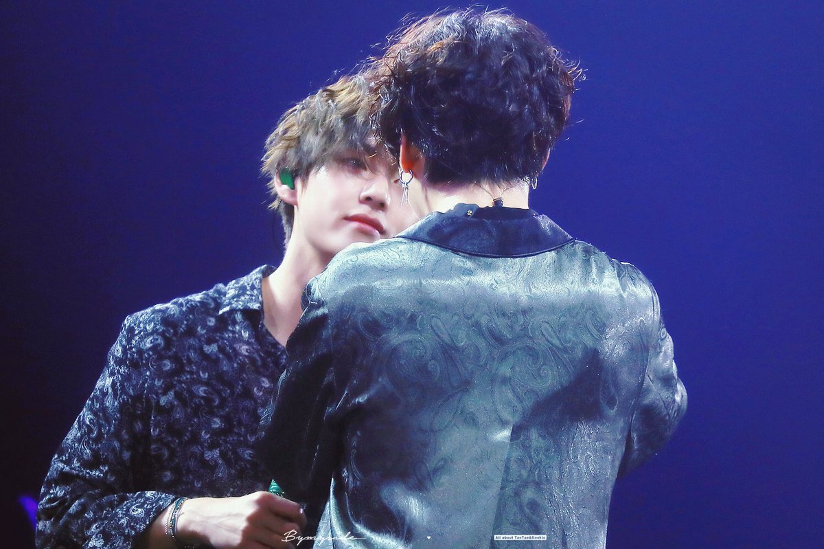 intertwining their hands