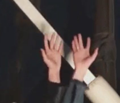 intertwining their hands