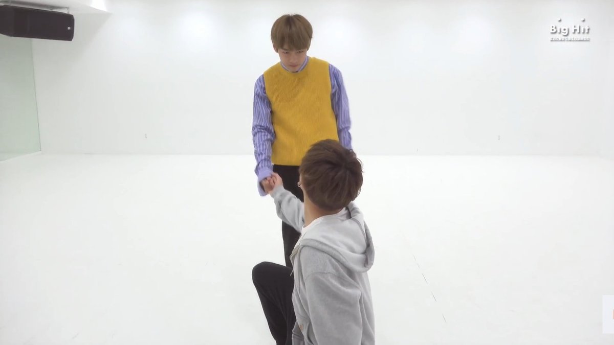 intertwining their hands