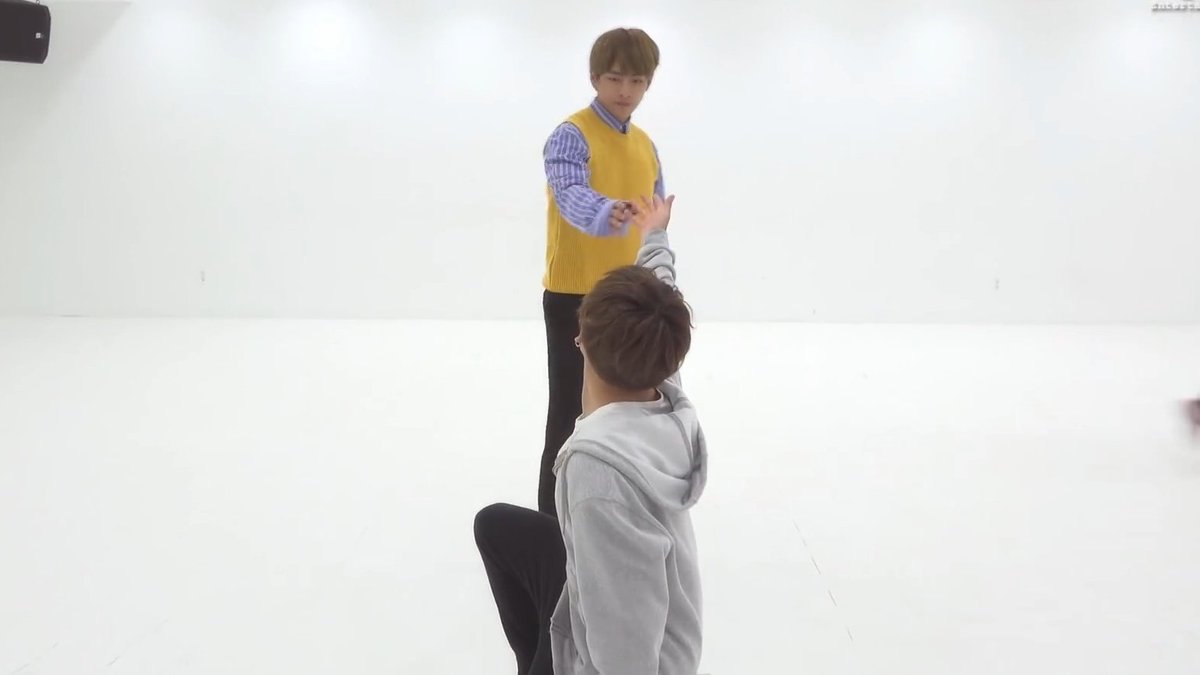 intertwining their hands