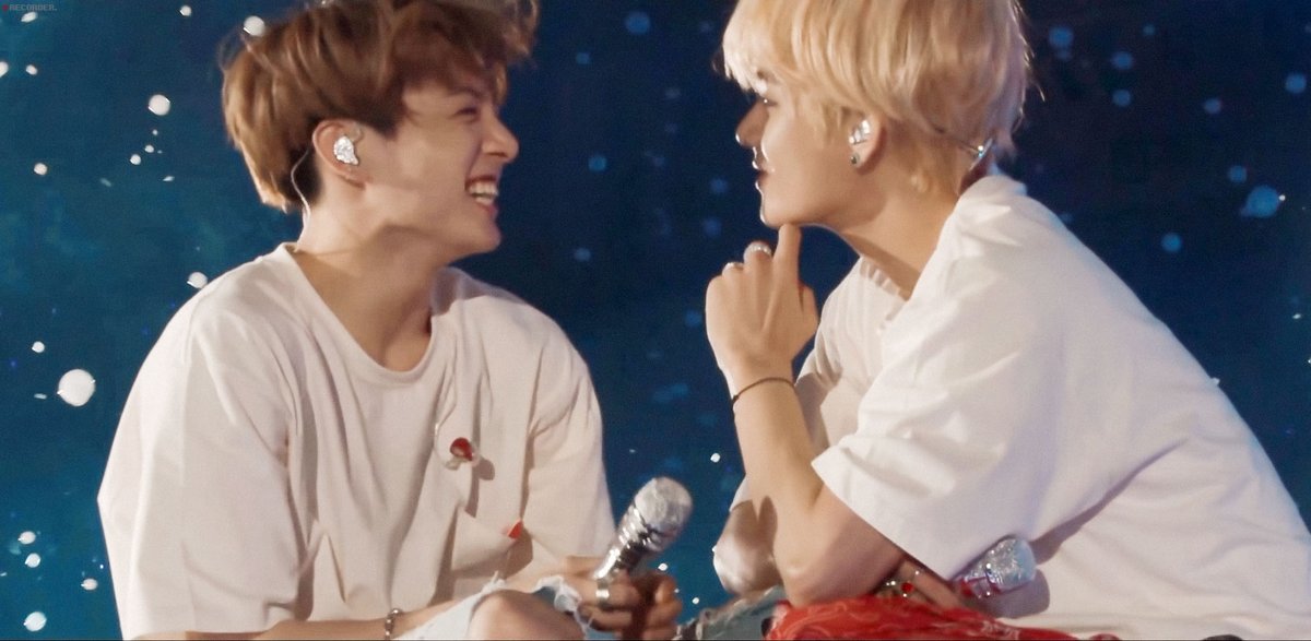 intertwining their hands