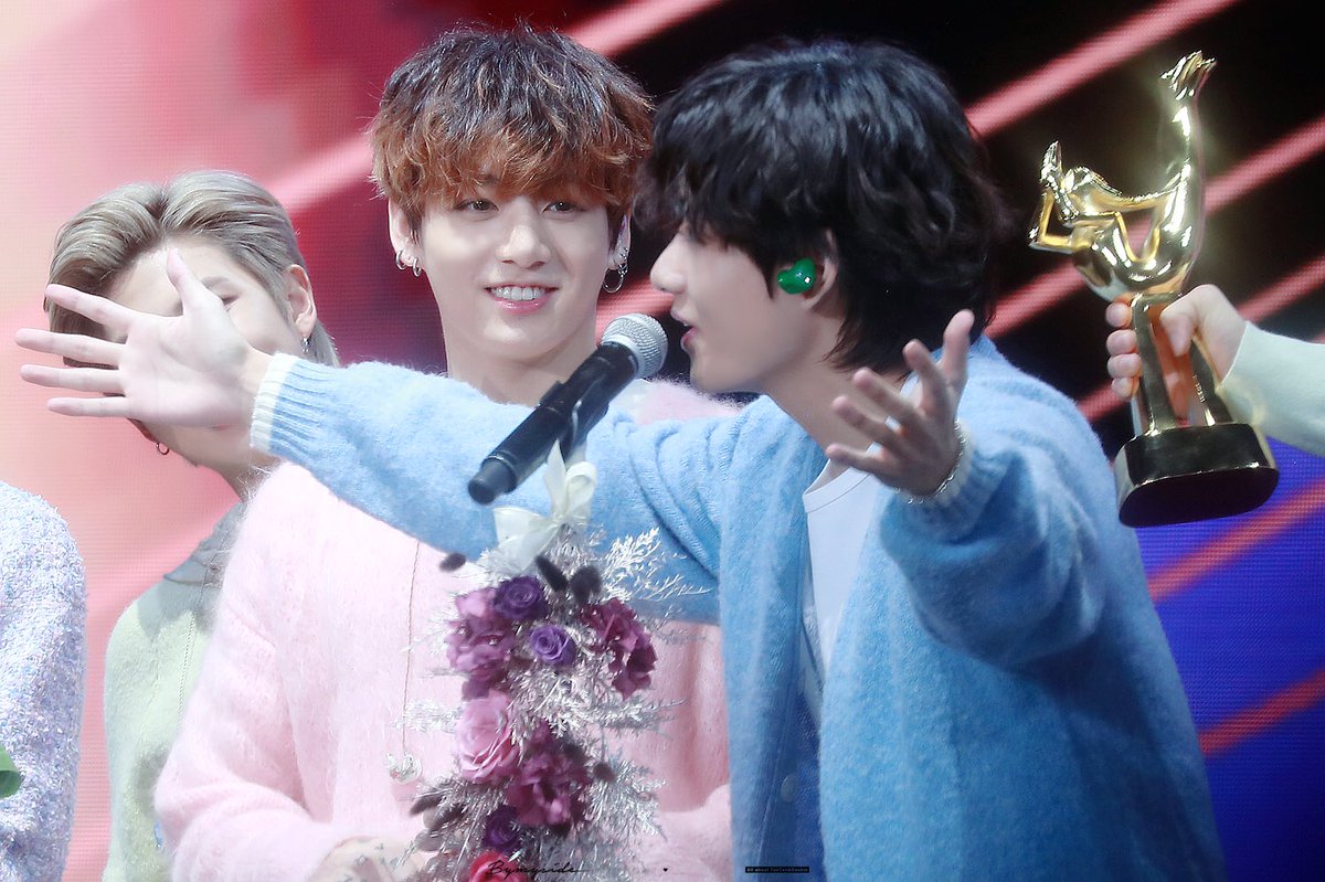 intertwining their hands