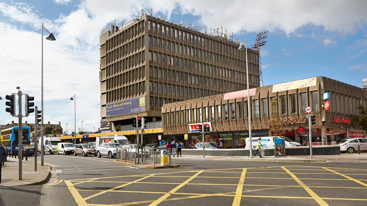 Emmett_Scanlon's tweet image. Two architecturally significant buildings in North Dublin, are the subjects of live #coliving planning applications . Phibsborough Shopping Centre + the Hendrons Building at Broadstone.  1/6