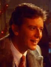 Gerald Hopkins. Smug, self-centered, egotistical. Most of his scenes were cut from the movie. Good thing, really.