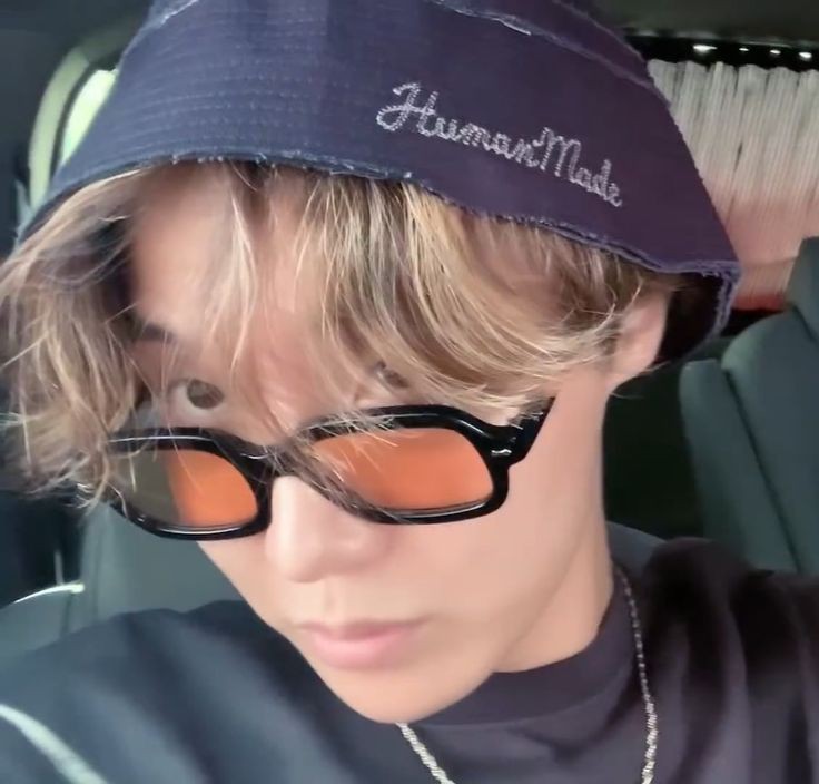 hoseok wearing glasses; a thread