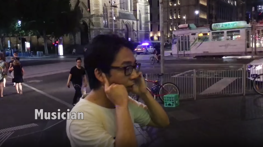 You can tell this is Melbourne because of the trams. That's St Paul's Cathedral behind Brett.