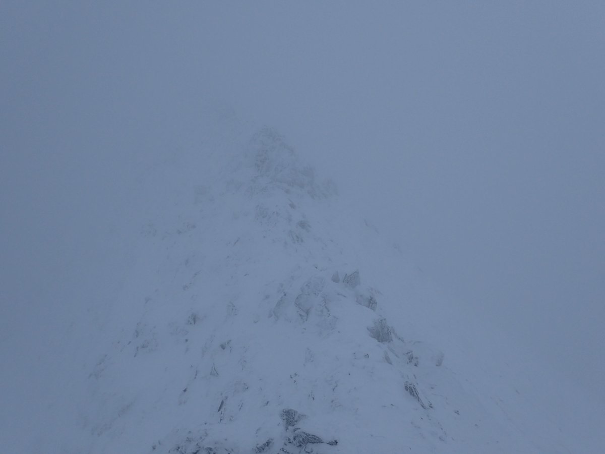 The view along Striding Edge with fresh soft snow above compacted older snow and ice. There were people out without crampons &amp; ice axes or maps asking directions. Fortunately they turned back before visibility dropped further &amp; underfoot conditions worsened. Jon