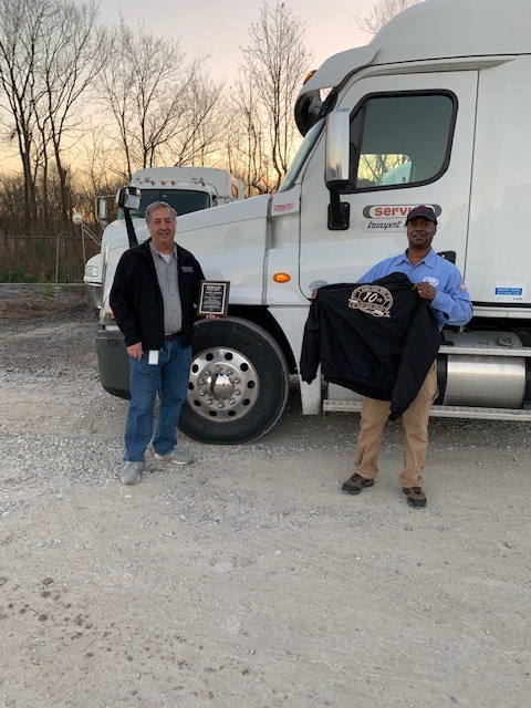 ServiceTransCo's tweet photo. Congratulations to St. Gabriel owner operator Donald Grover for achieving 10 years of safe driving.  Pictured is Donald (right) receiving his 10 year jacket and plaque from St. Gabriel terminal manager Dennis Gazzea (left). https://t.co/357sXpMyvi