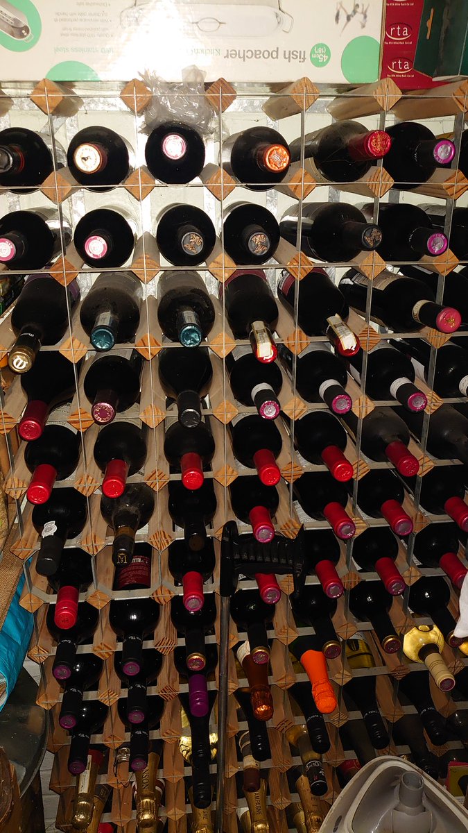 WilliamJohnOwen's tweet photo. @AdamHartScience Fortunately this time I didn't need to panic buy as the wine rack is full #lockdownready https://t.co/HV1c3labzI