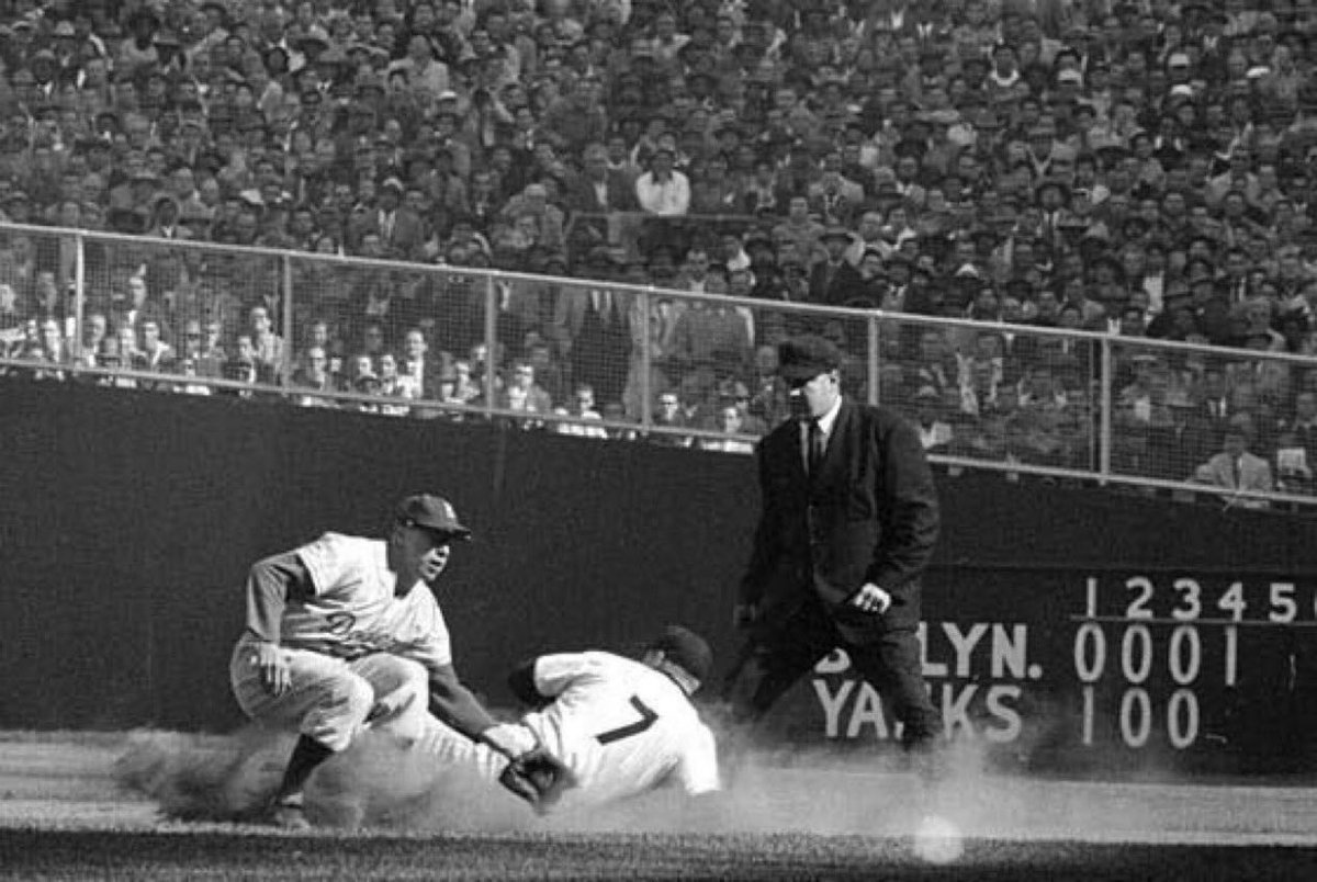 sigg20's tweet image. “Old Days”Mickey Mantle beats throw to Pee Wee Reese during the 1956 Dodger-Yankee World Series at Yankee Stadium.#Dodgers⁠ ⁠ #Yankees #NYC #Brooklyn #1950s #mlb