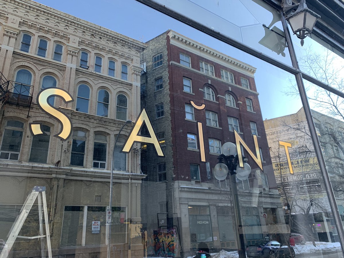 Went for a walk at lunch today and came across several new examples of downtown fading into darkness. This large and prominent barber shop has suddenly been gutted.