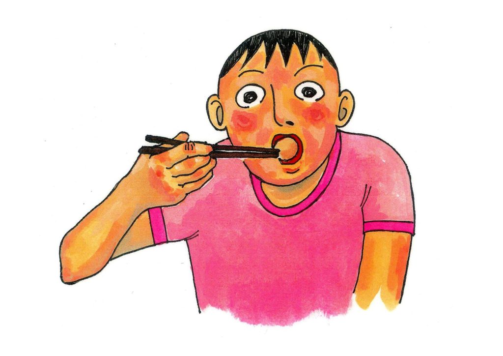 12. Komibashi 込み箸 ("stuffing chopsticks")Never use your chopsticks to stuff an already full mouth with even more food.