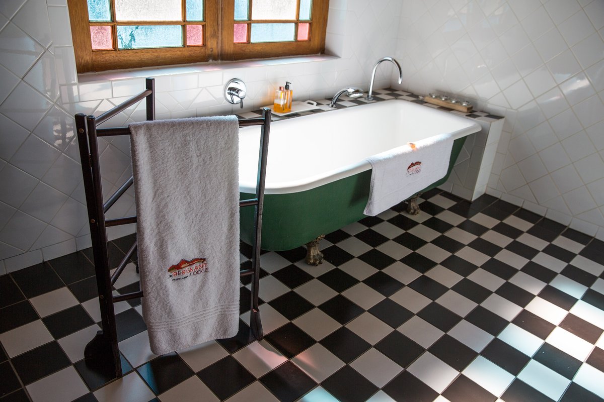 At De Bergkant Lodge our bathrooms are large, light and sunkissed by the Karoo's own special magic!
debergkant.com

#retrovintage #bathroomdecor #ensuite #4starluxury #heritagehotel #karooaccommodation #antiquebathrooms #capedutchhotel #blackandwhitetiles #stainedglass