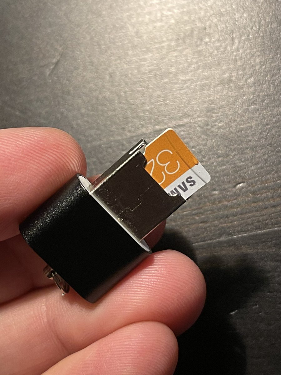 shanselman's tweet image. Random: can we just appreciate the mad scientist who looked at a USB key and figured there was enough room TO SHOVE A MICRO-SD CARD into the end?