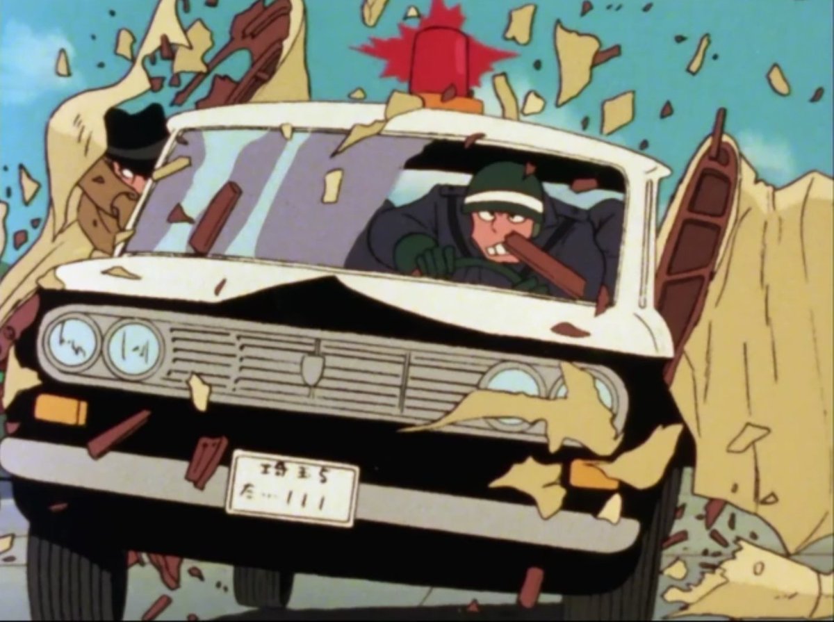 And then Zenigata arrives !This is, again, some nice mvt into depth, but what's really amazing is the sense of detail. The debris and broken up parts of the plane are very minutely drawn ; and if you go frame by frame, you can even see the faces of the two policemen in the car
