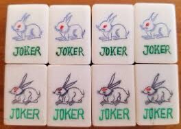 I also found more kitschy American tiles. Learning that the 萬 set is called "characters", but "crack" for short... cue firework/lightning puns.American sets also have Jokers, which I found surprising. Apparently vintage sets can be dated on how many jokers come with the set.