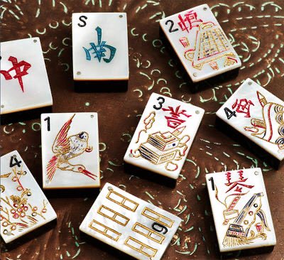 I'm also struck by how varied the designs are. I grew up in an extended family that took mahjong very seriously and to me mahjong sets are very standardised. It's exciting and strange to see the variety. From:  https://www.vpr.org/post/little-tiles-big-happiness-brief-history-mah-jongg