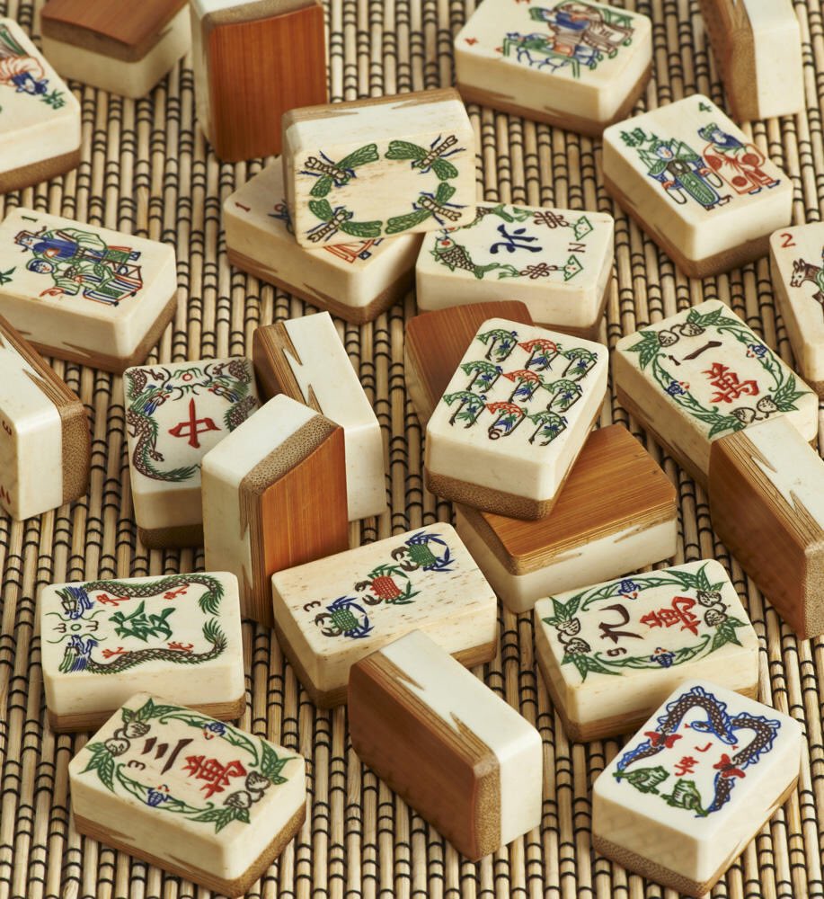 I'm also struck by how varied the designs are. I grew up in an extended family that took mahjong very seriously and to me mahjong sets are very standardised. It's exciting and strange to see the variety. From:  https://www.vpr.org/post/little-tiles-big-happiness-brief-history-mah-jongg