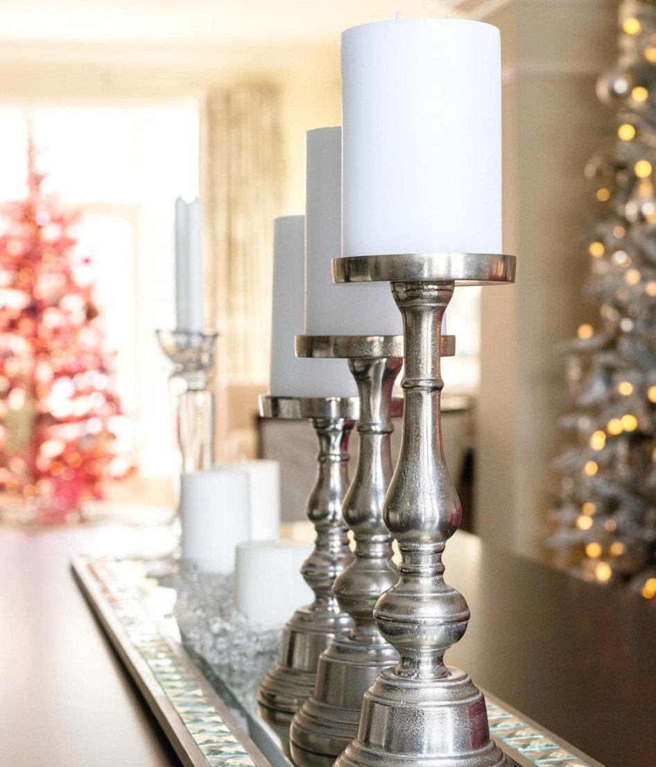 In her family’s dining room, <a href="/mandyrenfrew/">Mandy Renfrew</a> included silver and white accessories to complement the snow-covered tree in the design and create an elegant space to enjoy meals with her family!🎄