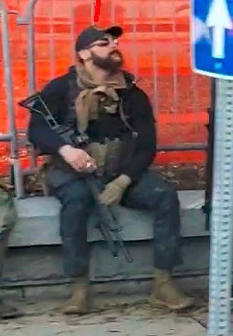 5/ Though Cooper is masked in the attack video, he was happy to appear unmasked throughout the rally preceding the attack, and can be identified by his gun, pants, shoes, hat, and sunglasses.In a profile picture on his since-deleted Facebook page, he poses with his gun.