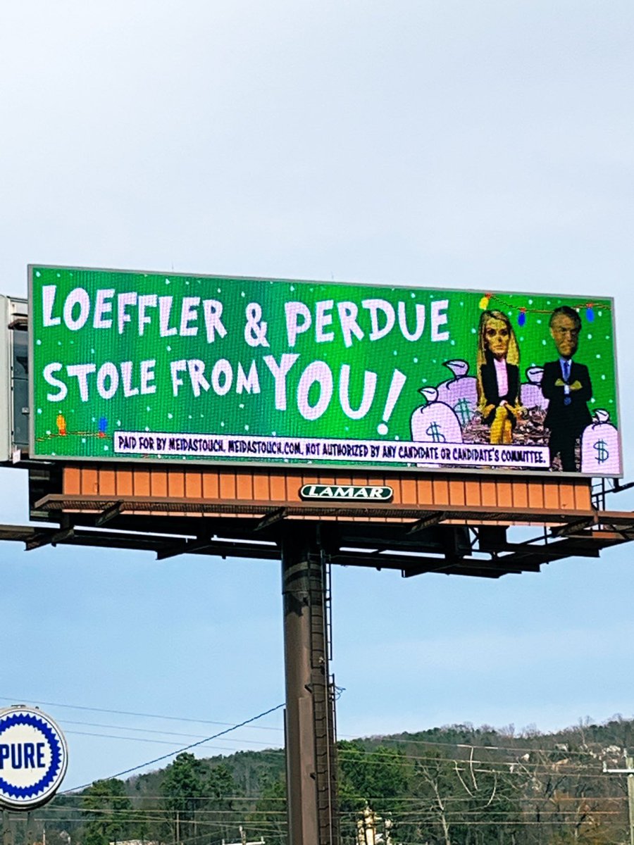 MeidasTouch's tweet photo. This billboard is currently up across Georgia https://t.co/ePqiftNH8q