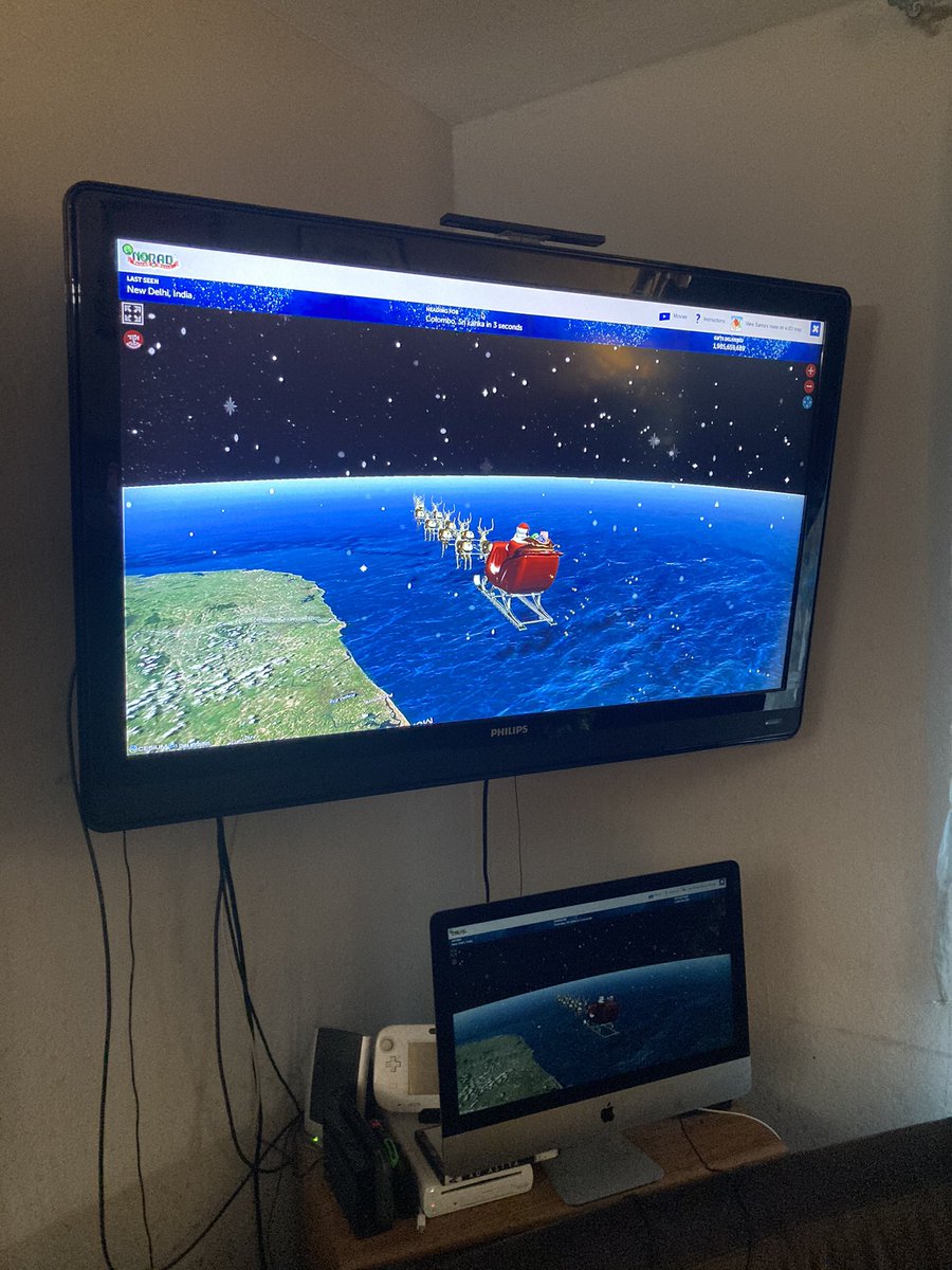Picture of the NORAD Santa tracker on a big TV