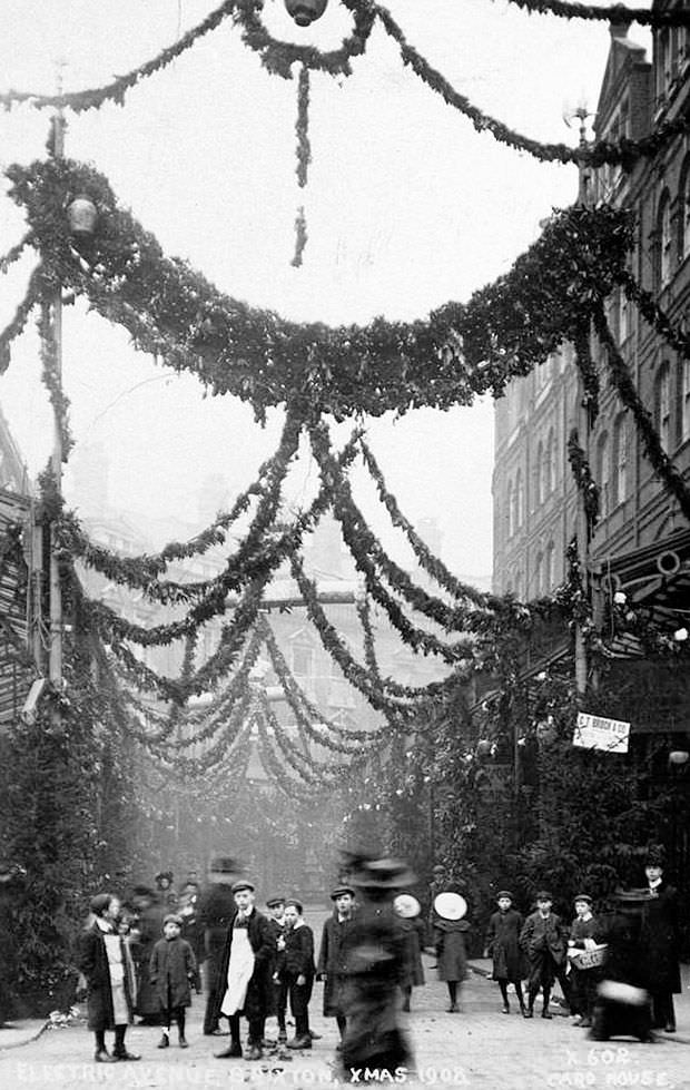 Street decorations for Christmas in London in 1908.