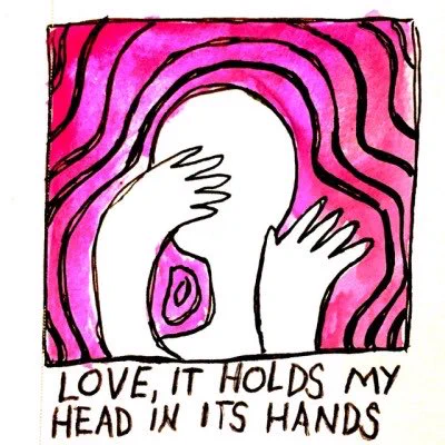 Love, it holds my head in its hands / it makes me shake once again 