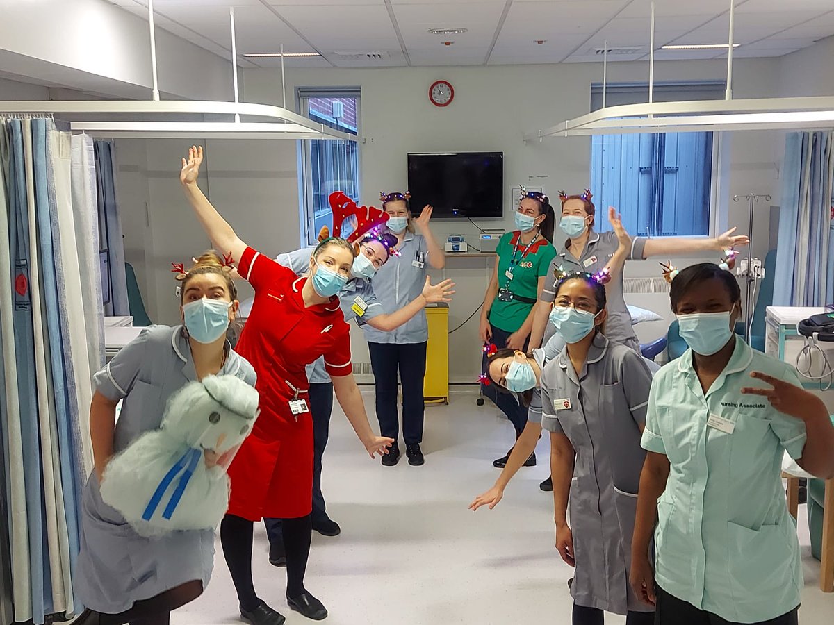 clarentina's tweet photo. couldn't love my team more- is it even an NHS staff photo unless someone says 'do something silly' and it's extremely awkward #haemdayunit https://t.co/nsmGS8xPzm