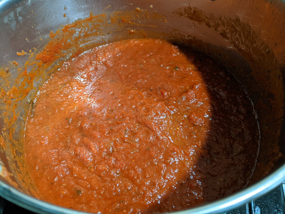 Did you think the sauce thread was over?!Acidity has gone down. Wine, spices, onion, garlic, secret ingredient have all melded together.It takes about *mumble* hours for this to work, IMO.Sorry, don't have exact timings; there was wine.