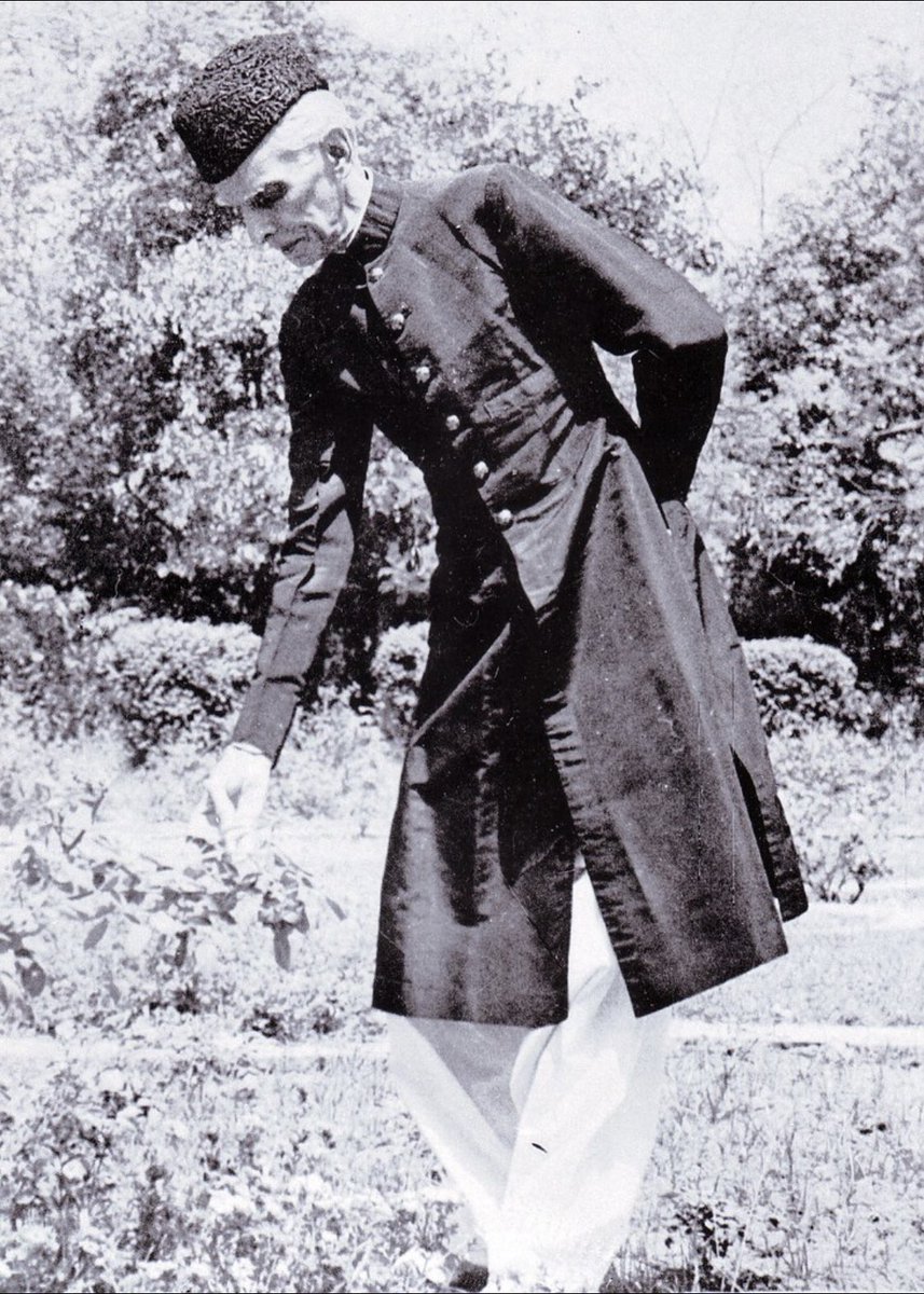 Quaid-e-Azam admiring flowers