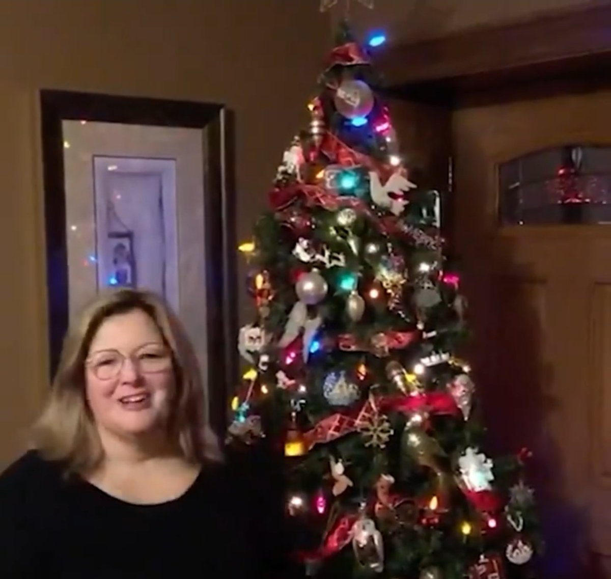 She says she calls this tree a "memory tree".Of course she does.It's where she thinks of her friend Craig.And her friend Frank.