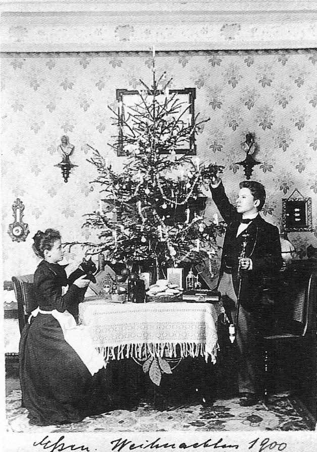 Victorians would often combine their sparkly bought decorations with candles and homemade edible treats, tied to the branches with ribbon.