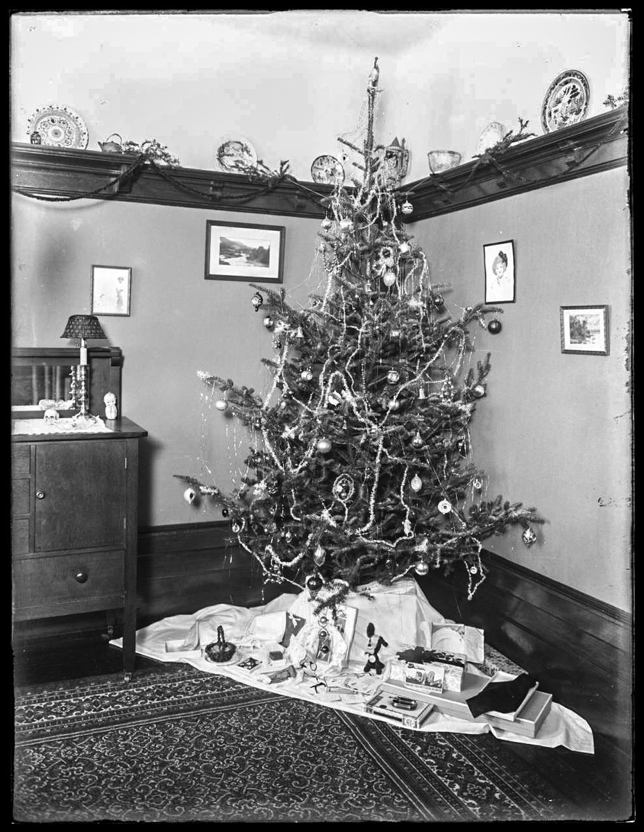 These were usually hung on the Christmas tree. However, as gift giving became more central to the festival, and the gifts became bigger and shop-bought, they moved under the tree.