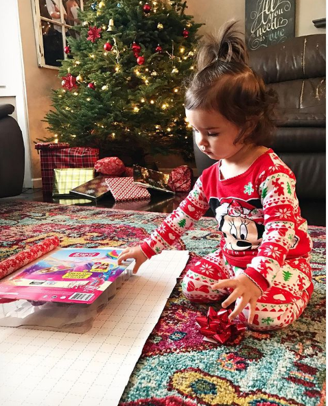 She has one more gift to wrap while Mummy and Da are sleeping. <a href="/Prince_Theirin/">Bryce Duncan Theirin</a> <a href="/CouslandDierdre/">Lady Dierdre Theirin nee' Cousland (RP account)</a>