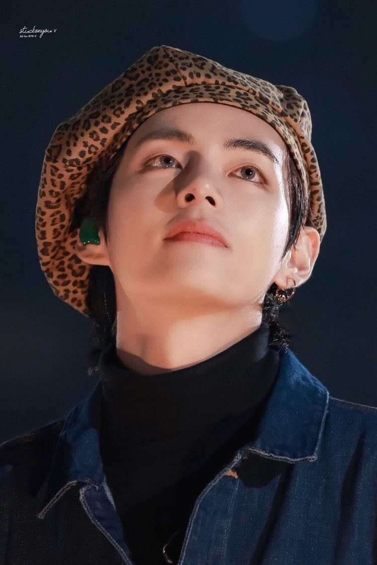 with his oversized cardigan