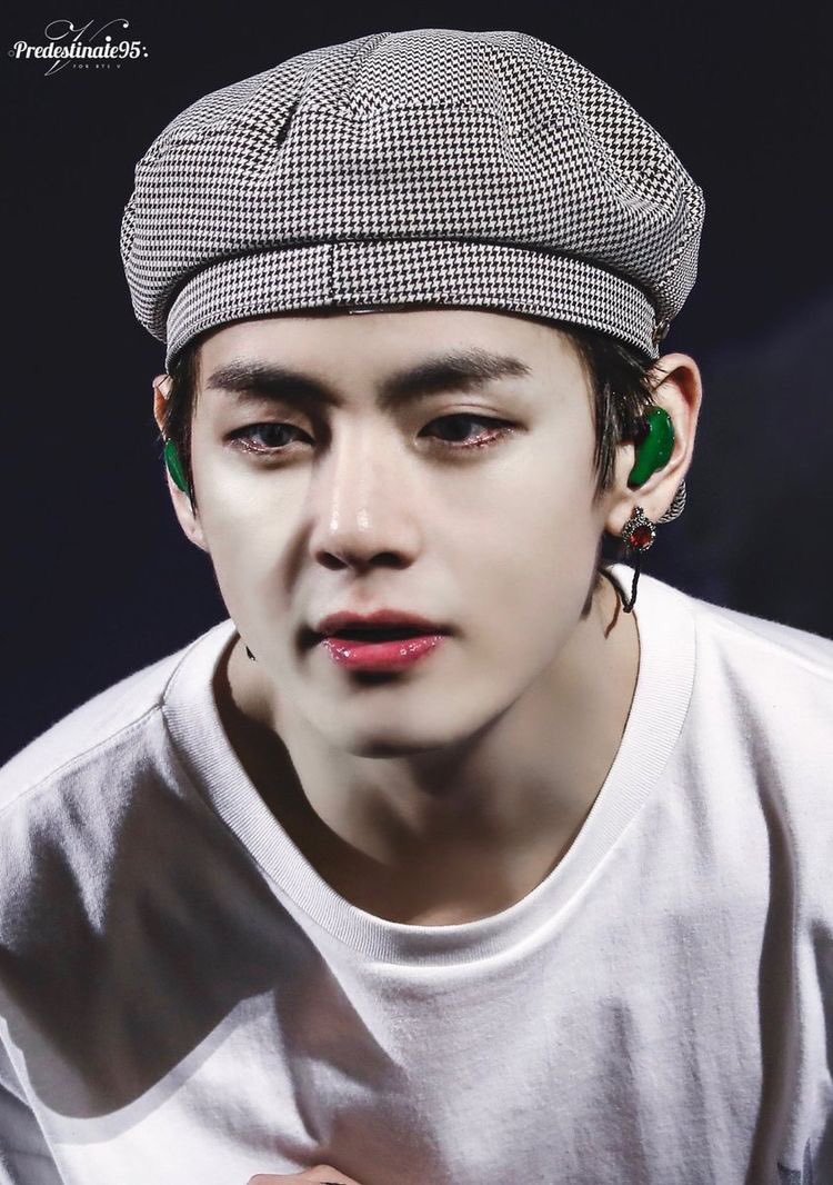 with his oversized cardigan