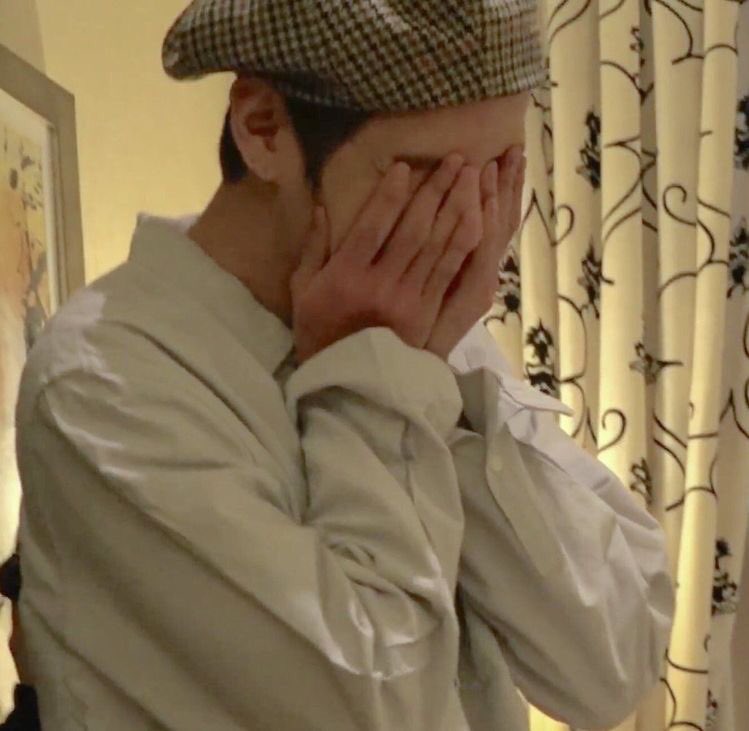 with his oversized cardigan