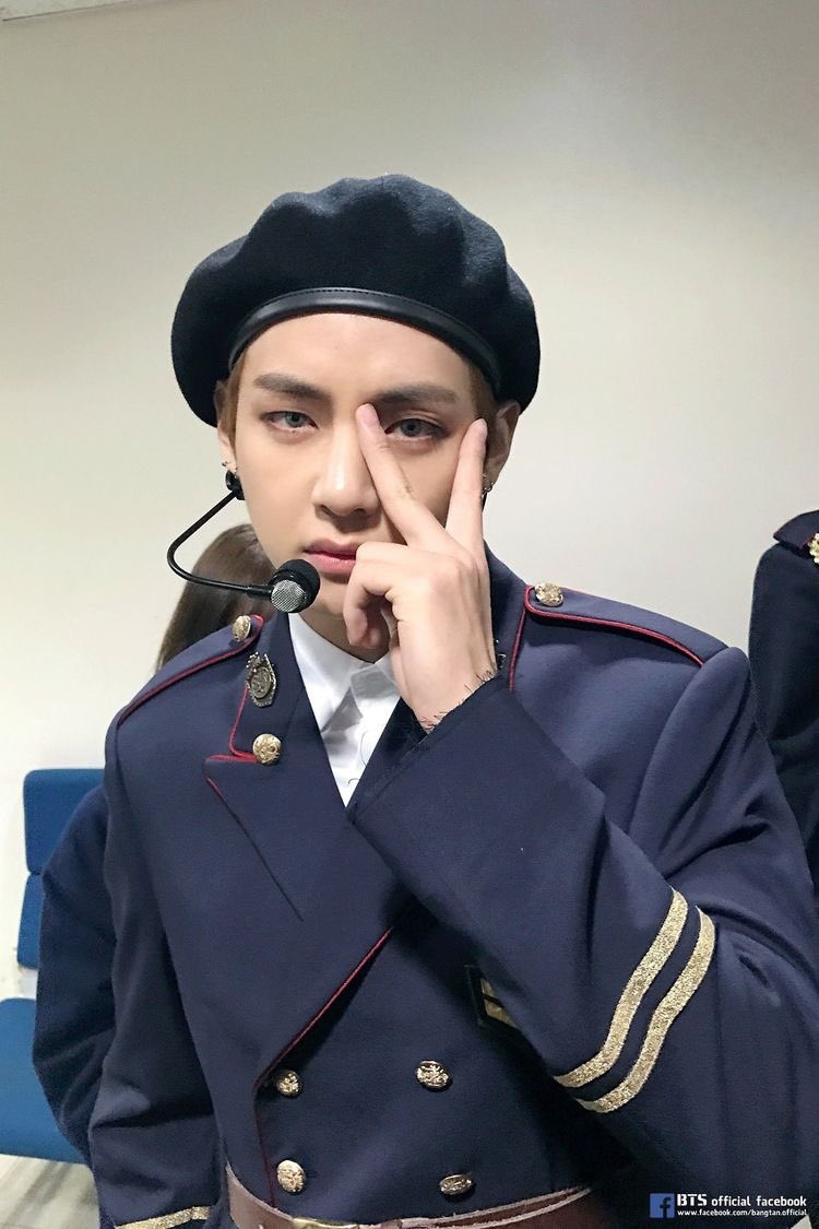 with his oversized cardigan