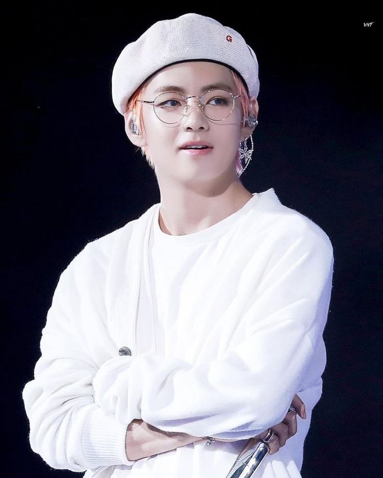 with his oversized cardigan