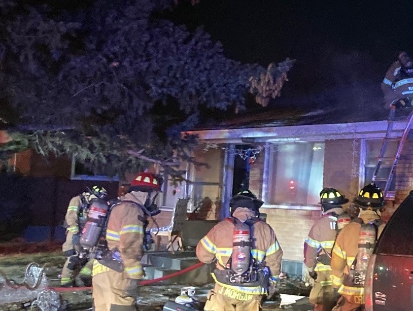 A police officer with the <a href="/IdahoFallsPD/">Idaho Falls Police</a> was driving by the home when he noticed fire coming from the roof. The officer knocked on the door and quickly began evacuating approximately forty people from inside the home and garage. idahofallsidaho.gov/CivicAlerts.as…