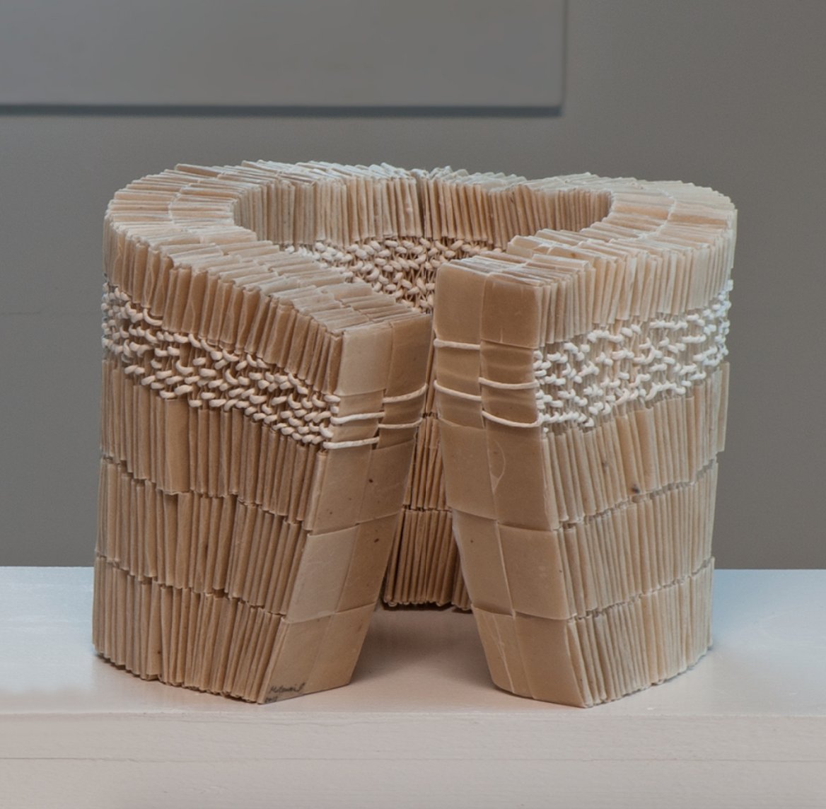 mutsumi iwasaki's waxed paper sculptures are so simple and perfect, like stacked wood or a fence slanting from its own weight