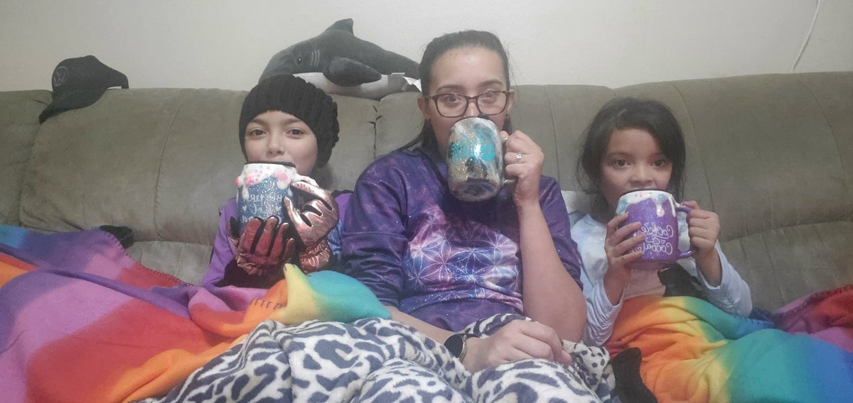 Me and my kids before the movie marathon begins! Easy day relaxing and being with the family. New cups, new pajamas, new traditions