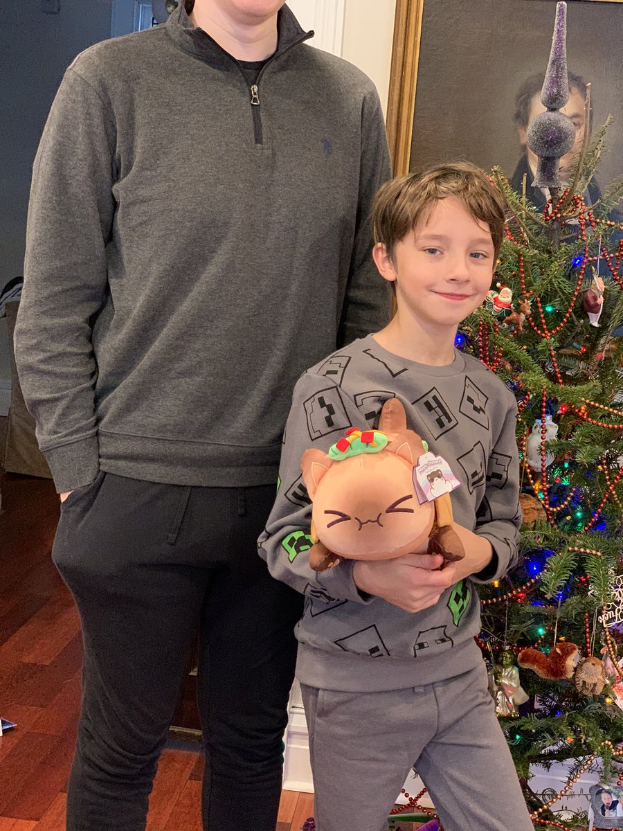 Your family photos inspired our Christmas portrait of Levi and Cary