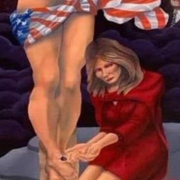 What is MelT doing?A) She’s attempting to pull out a comically large nailB) She’s hit the jackpot & is waiting for the change to fall out his spear holeC) She’s marveling at missing metaphorical handcuffs. She’s free nowD) She broke a nail