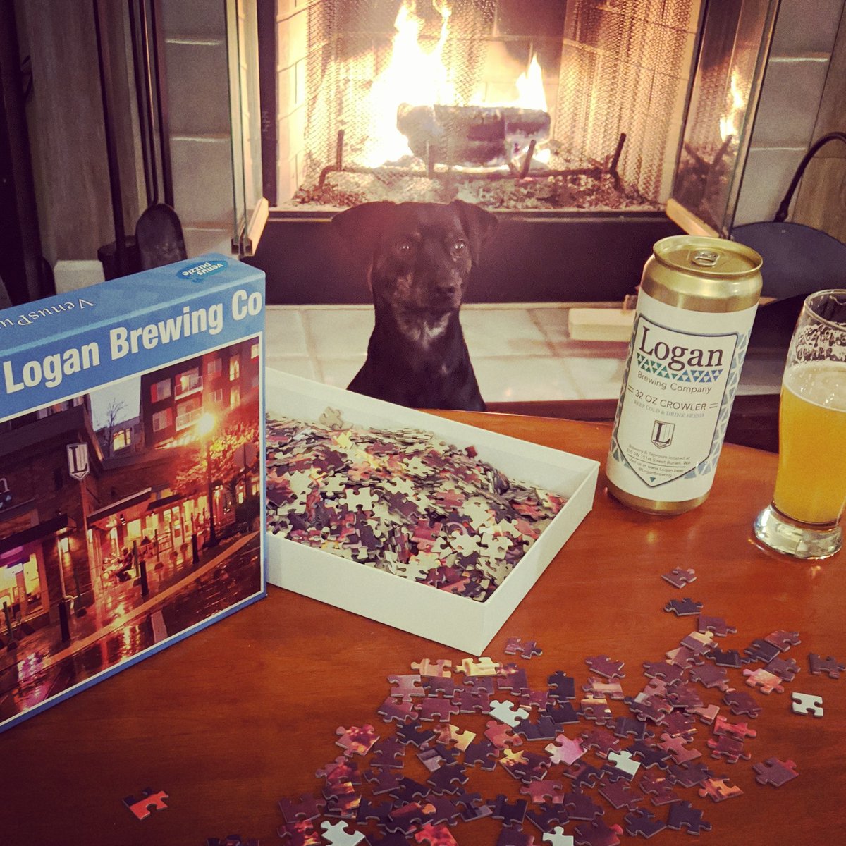 LoganBrewing's tweet photo. Merry Christmas 🎄 Pesto the brewdog is enjoying Christmas with a crowler and a very special puzzle. 🎁 We hope your Christmas is a cozy as ours and we'll see you in the taproom this weekend. ❤️ #LoganBrewing #edgepieces #puzzle #christmasday #cozy #cozyvibes #dogsofinstagram https://t.co/WIJlOE3Frl