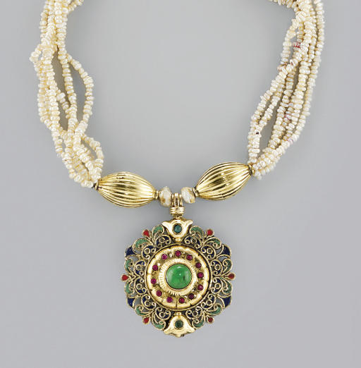 4 - A gemset and enamelled gold pendant necklace (19th century, city: Tangier) (site:  https://www.christies.com/lot/lot-a-moroccan-gemset-and-enamelled-gold-pendant-4979784/?from=searchresults&intObjectID=4979784)